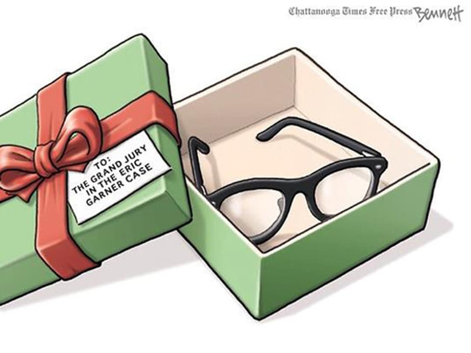 Karikatur eines geöffneten Geschenkes, darin liegt eine Brille.