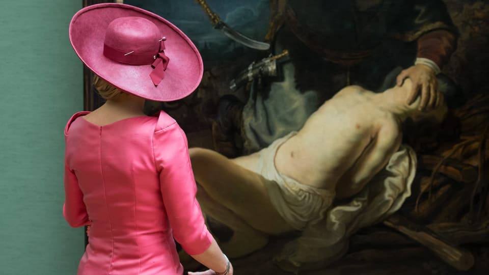 Königin Máxima studiert ein Gemälde von Rembrandt in der Alten Pinakothek in München. 