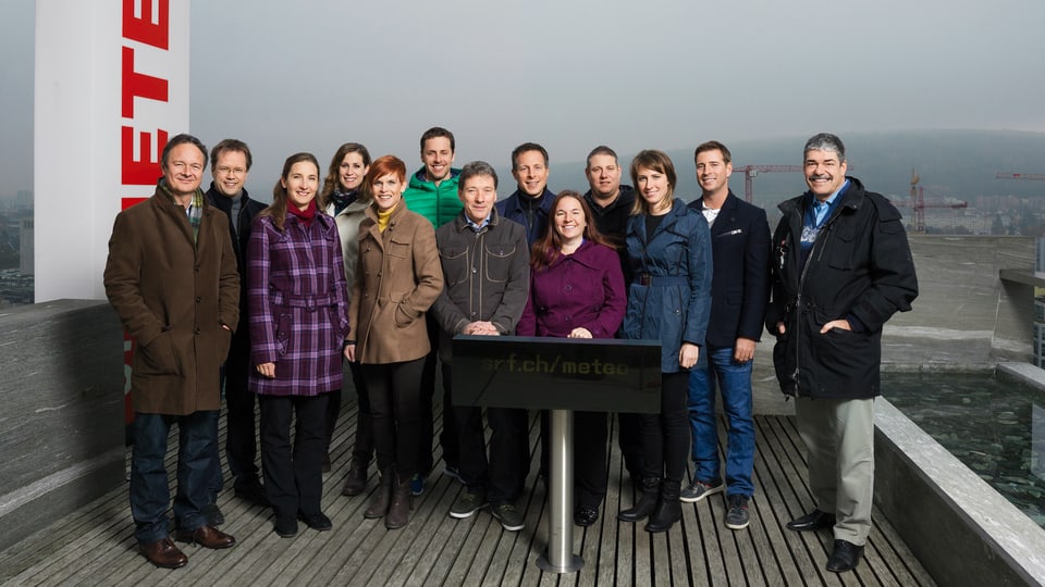 Team von Meteorologen auf dem Dach des Schweizer Fernsehens.