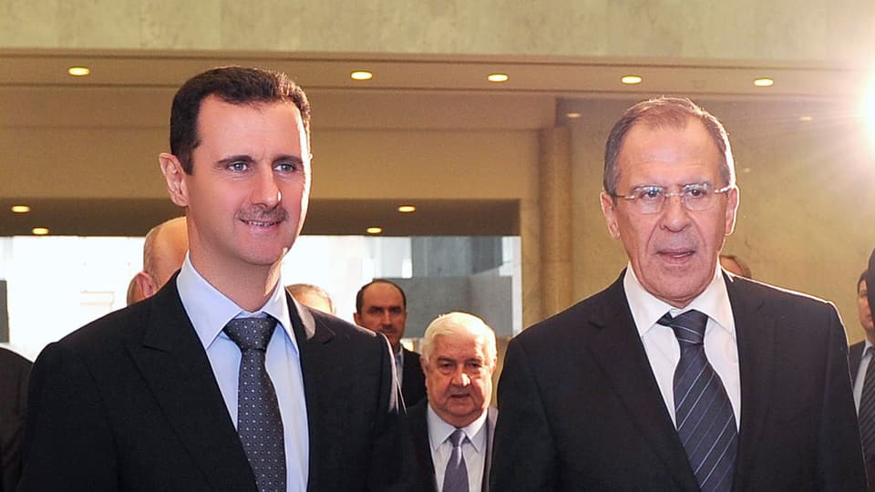 Assad (l.) und Lawrow.
