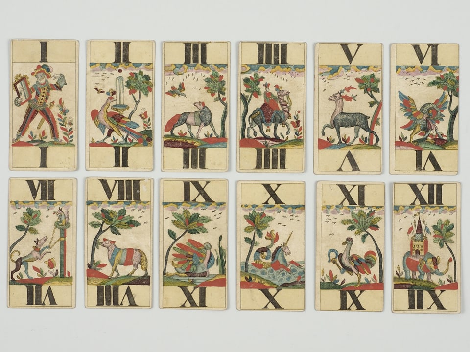 Tiere auf einem alten Kartenspiel.