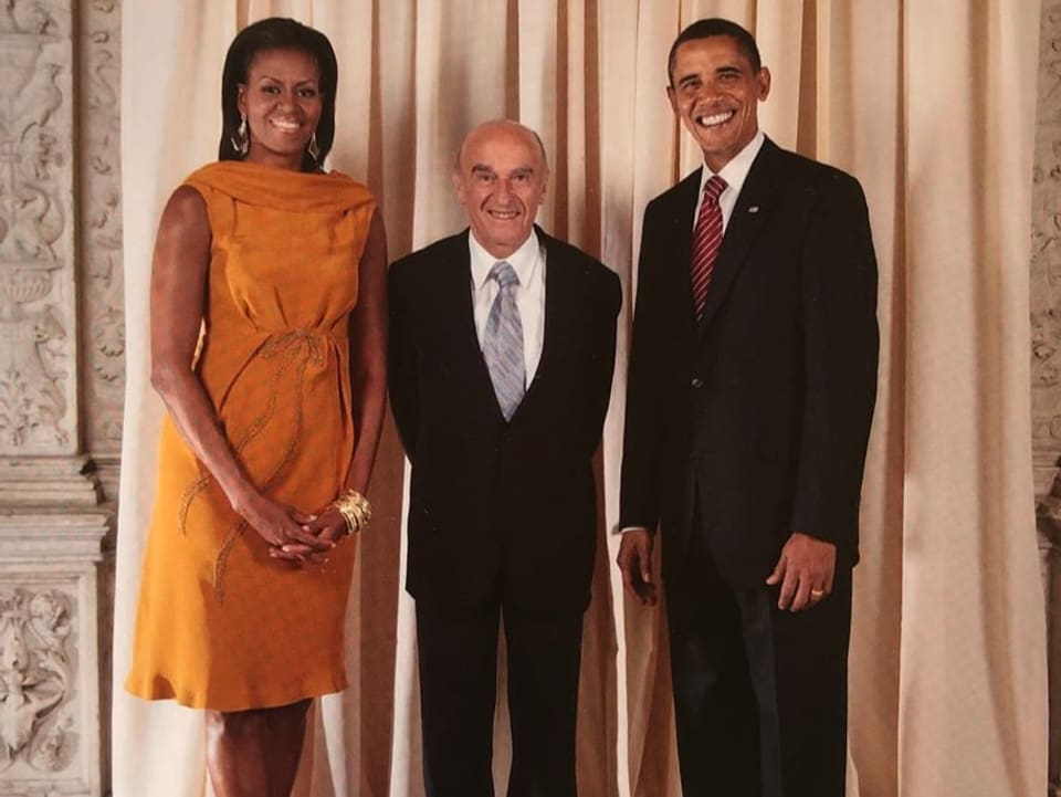 Hans-Rudolf Merz steht zwischen Michelle und Barack Obama 