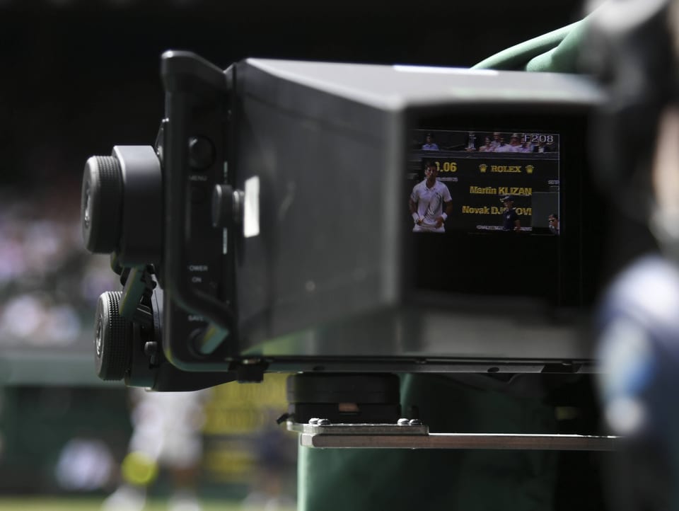Novak Djokovic im Fokus einer Kamera