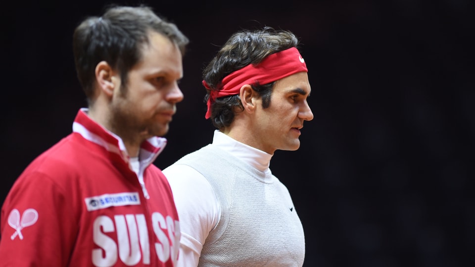 Lüthi und Federer mit ernster Miene.