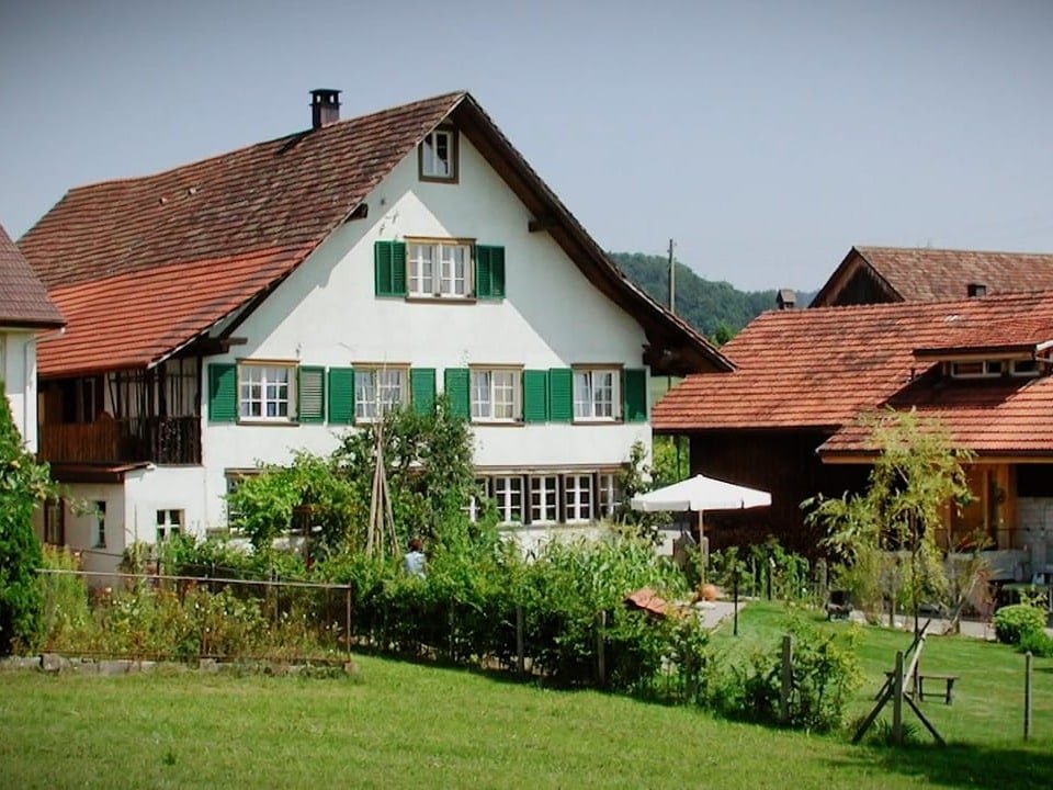 Ein Bild eines Bauernhauses.