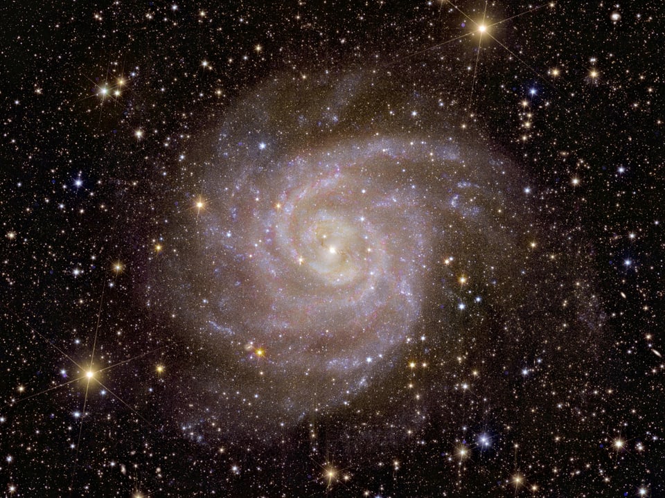 Eine spiralförmige Galaxie namens «Hidden Galaxy».