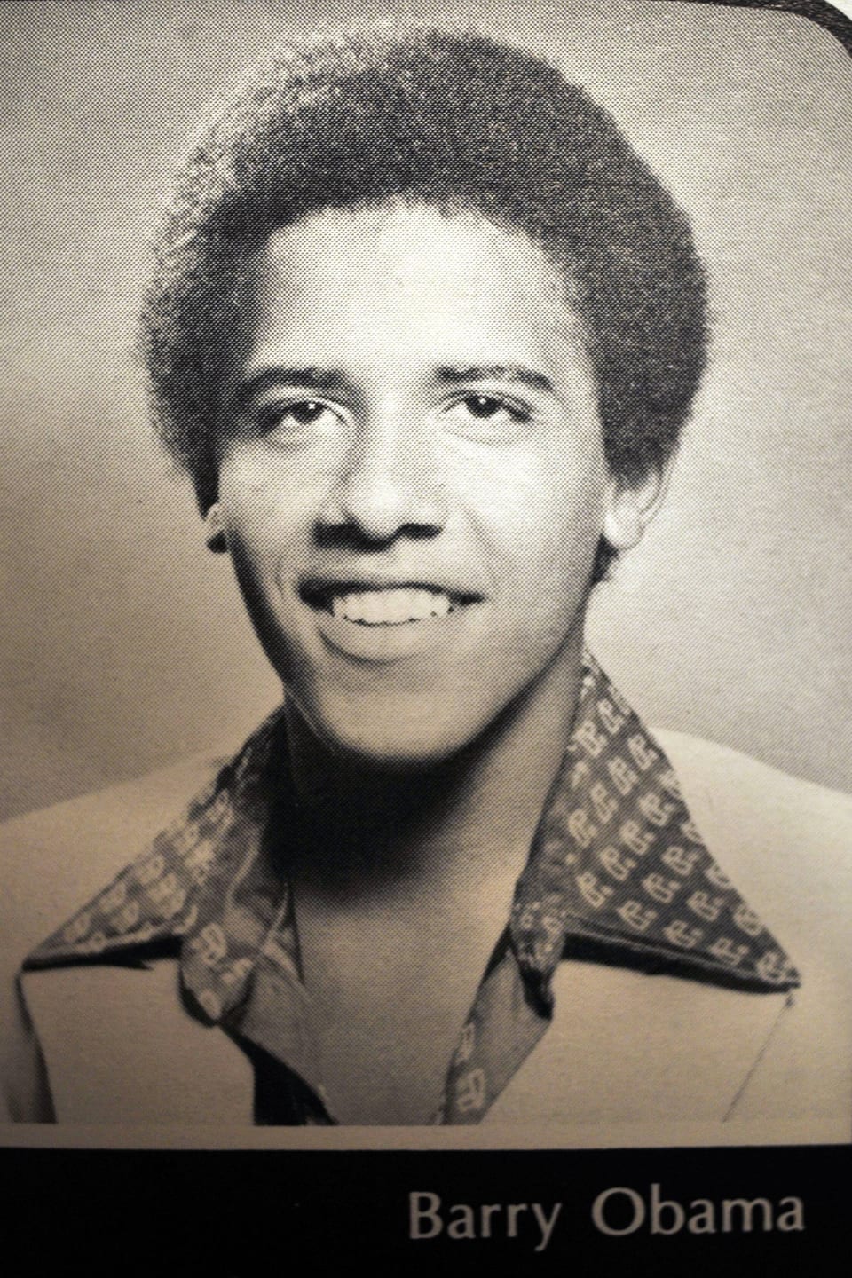 Black and white photo of a young African American man.