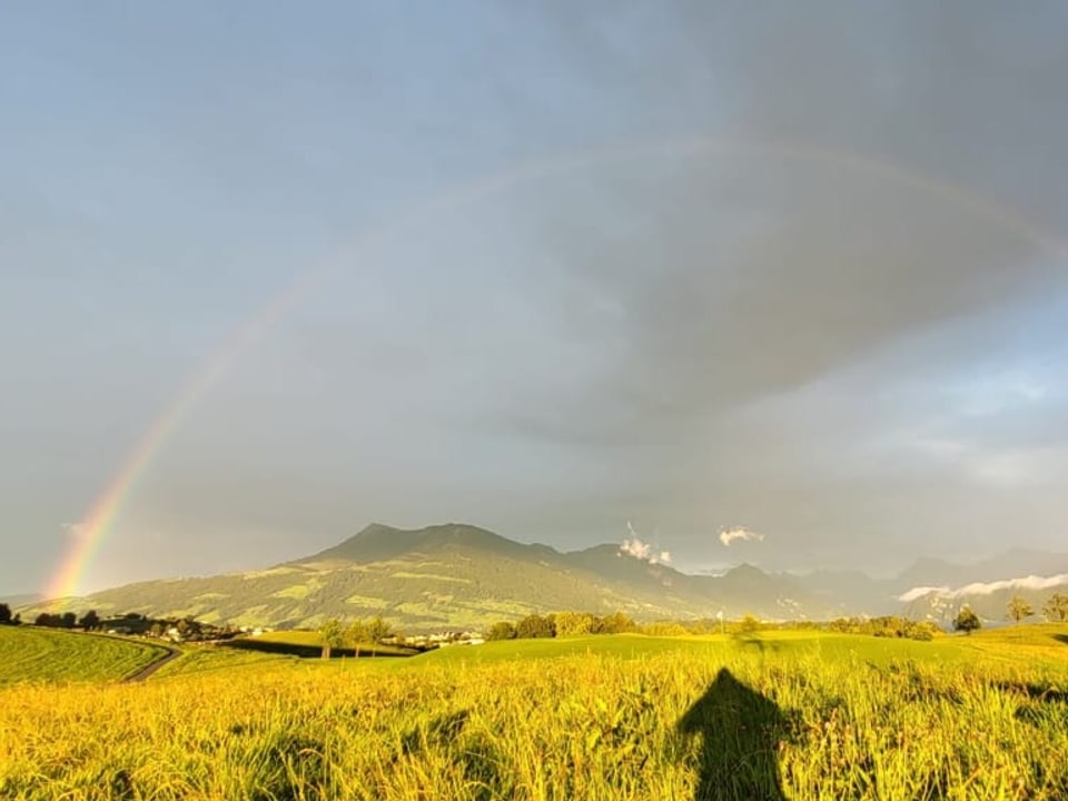 Regenbogen über dem Golfplatz