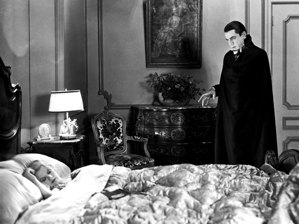 Helen Chandler als Mina, Bela Lugosi als Graf Dracula.