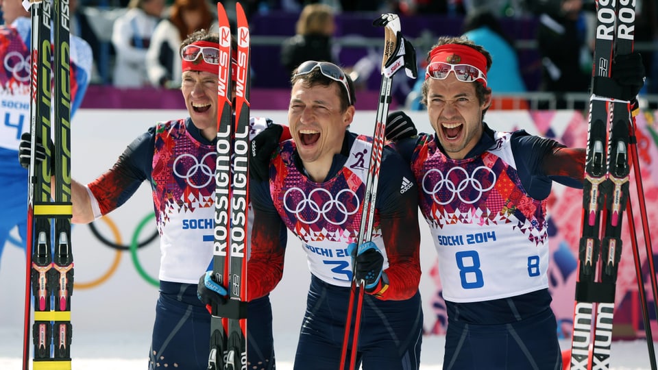 Die drei russischen Athleten jubeln in die Kamera