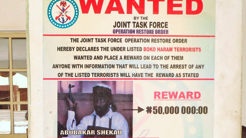 Ein Plakat zur Verhaftung des Boko Haram-Anführers.