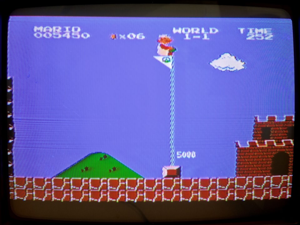 Mario am Schluss des ersten Levels.