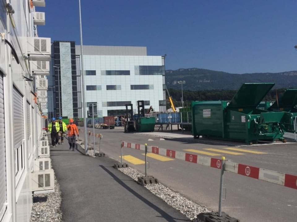 Verschiedene Gebäude, Bauarbeiter.