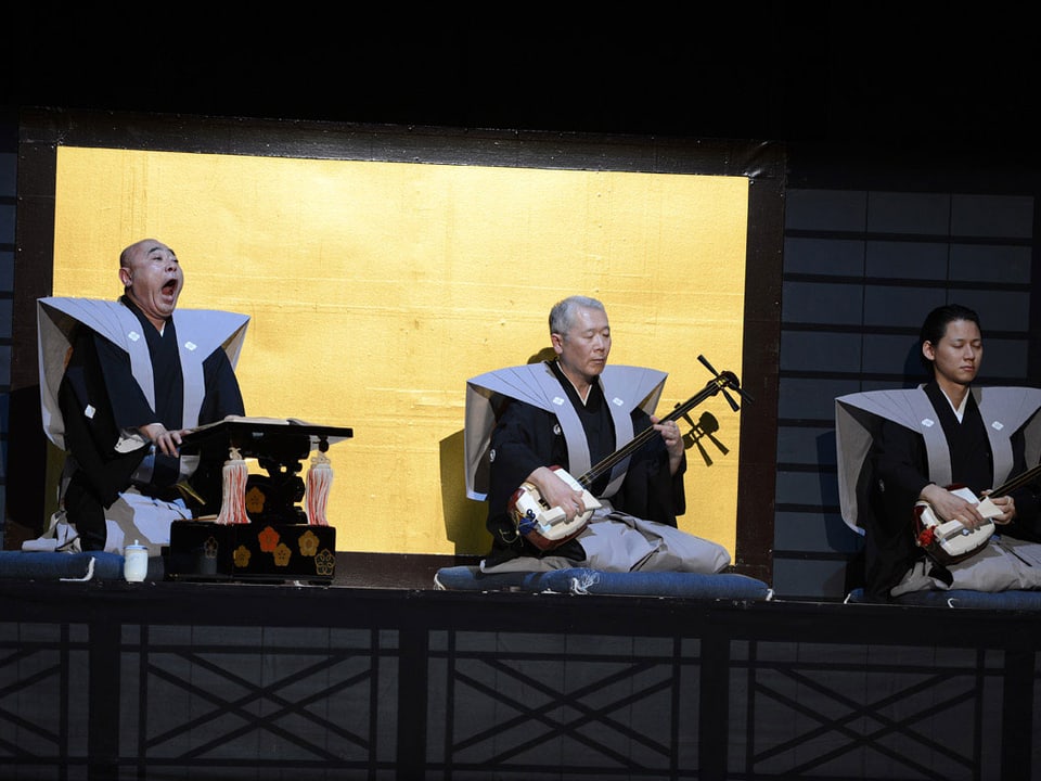 Drei japanische Musiker auf der Bühne