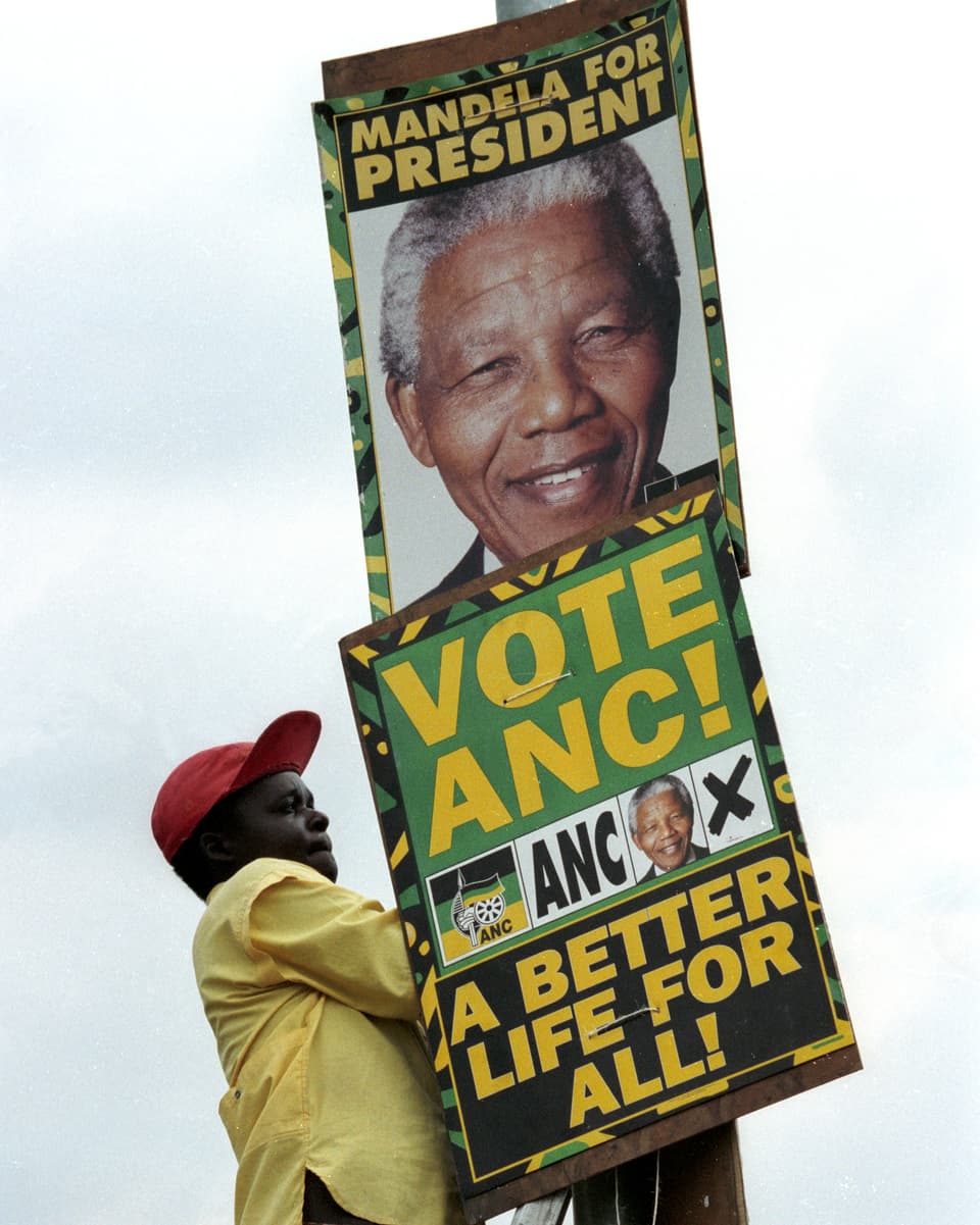 ANC-Plakat mit Nelson Mandela.