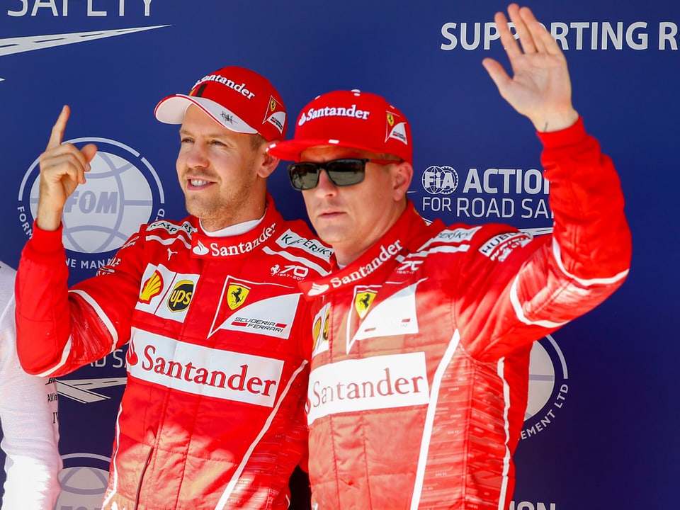 Sebastian Vettel (l) und Kimi Räikkönen.