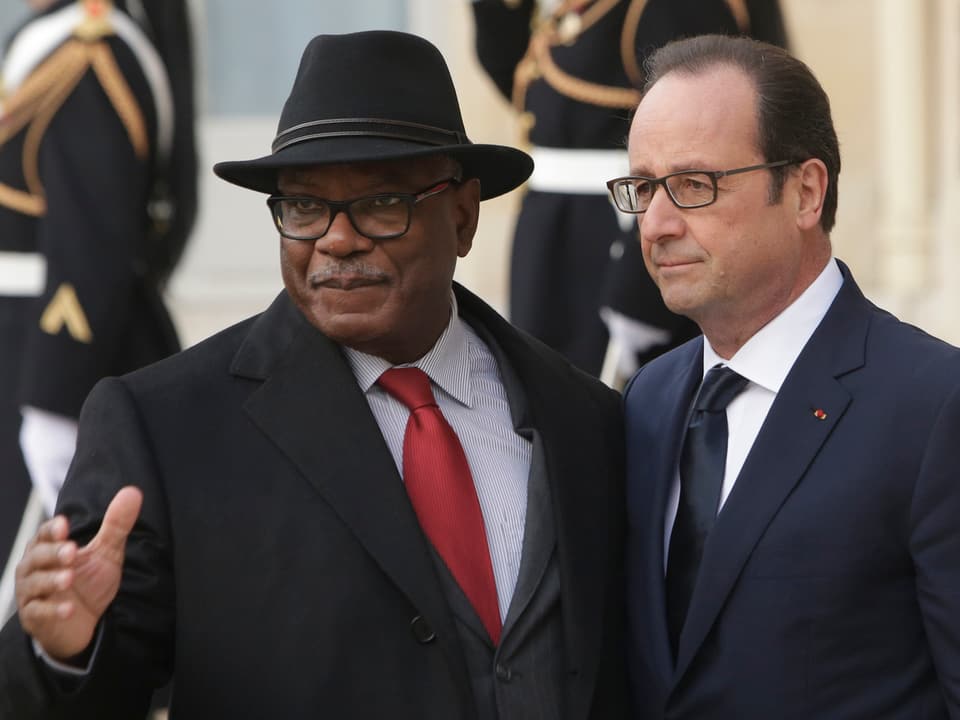 Ibrahim Keita (linke Seite),  François Hollande