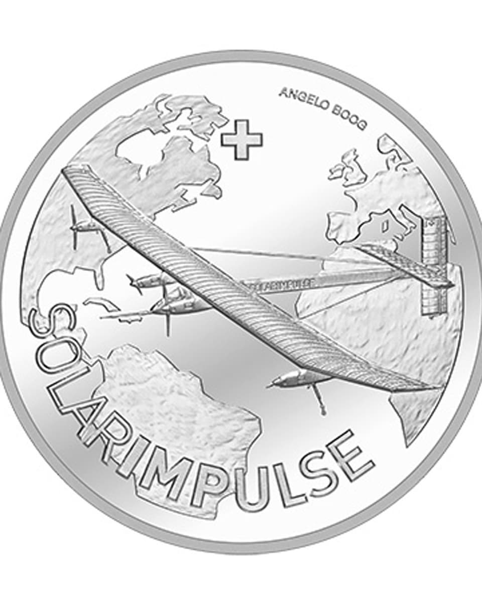 Silbermünze mit dem Flugzeug von Bertrand Piccard
