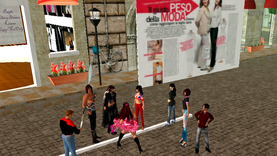 Eine Gruppe von Avataren in Second Life vor einem Spieleplakat.