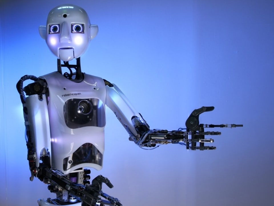 Bild des Roboters namens Robo Thespian mit «offenem» Blick und ausgestreckten Händen.