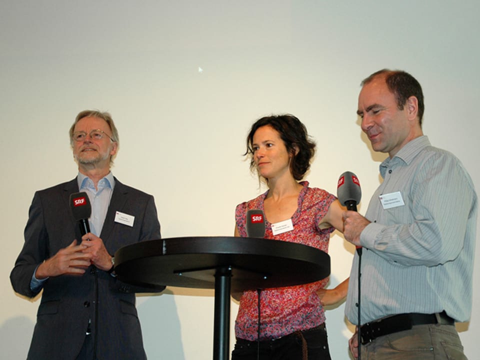 Caspar Selg, Priscilla Imboden und Philipp Scholkmann am Podium.