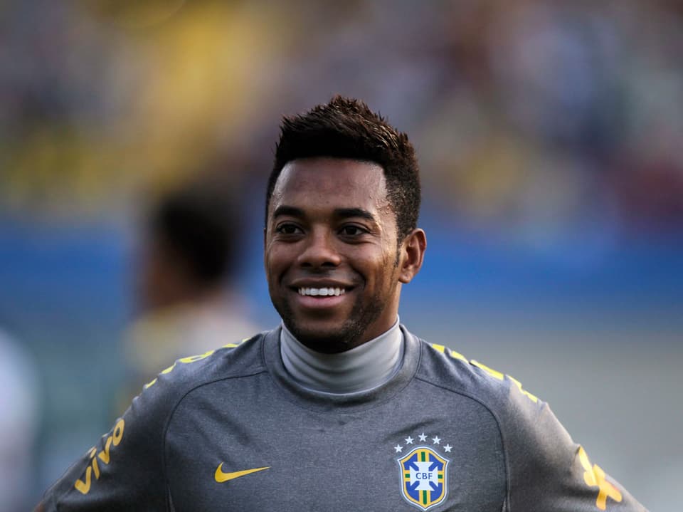 Porträtaufnahme von Robinho in einem Fussballtrikot der Brasilianischen Nationalmannschaft.