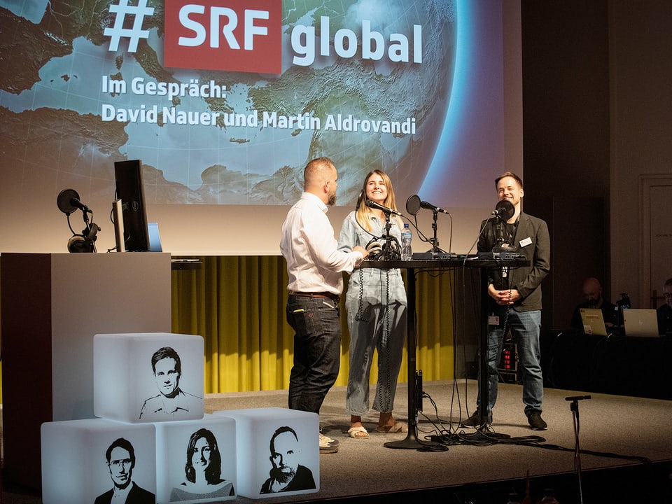 Live-Aufnahme von «#SRFglobal» mit David Nauer, Lea Saager und Martin Aldrovandi (von links)