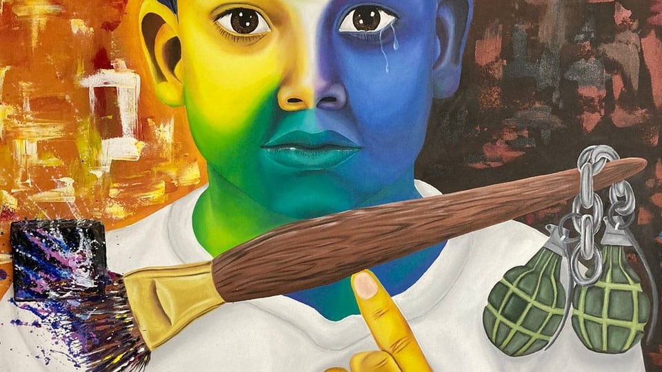 A boy balances a paintbrush: the colorful paint on the left weighs more than grenades and tears.