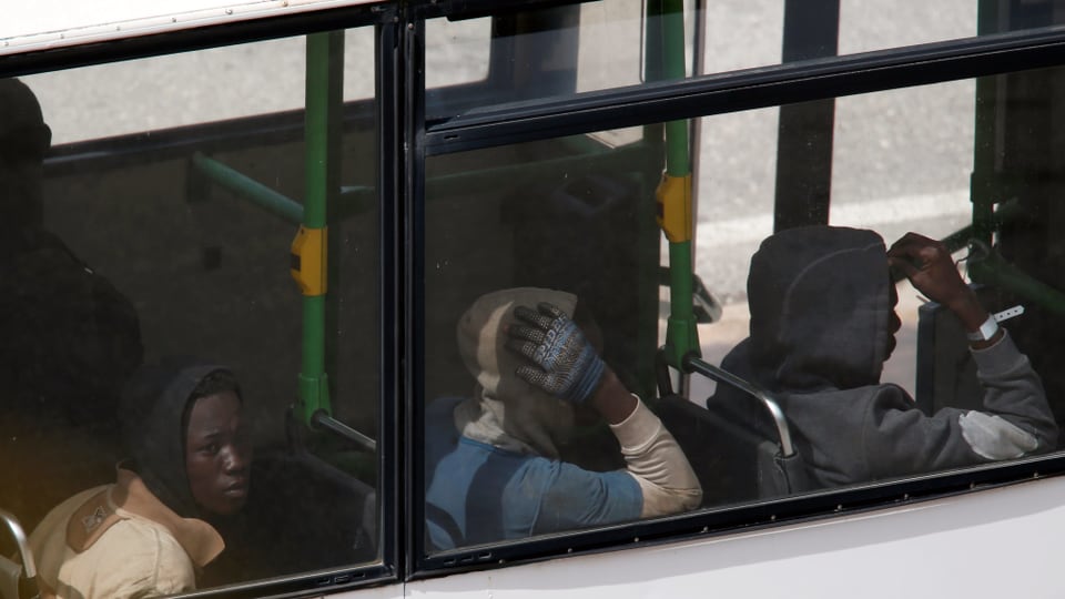 Flüchtlinge in Bus.