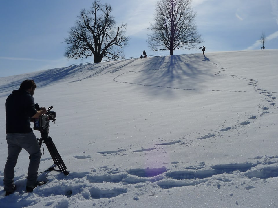 Kameramann im Schnee.