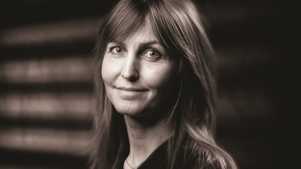 Sepia portrait of a woman with bangs