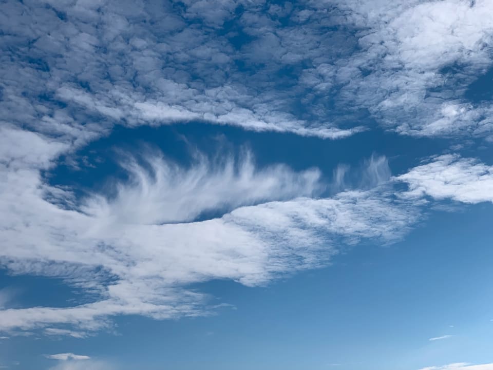 «Hole-Punch Clouds»