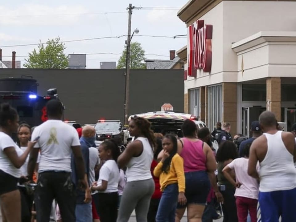 People in front of the store