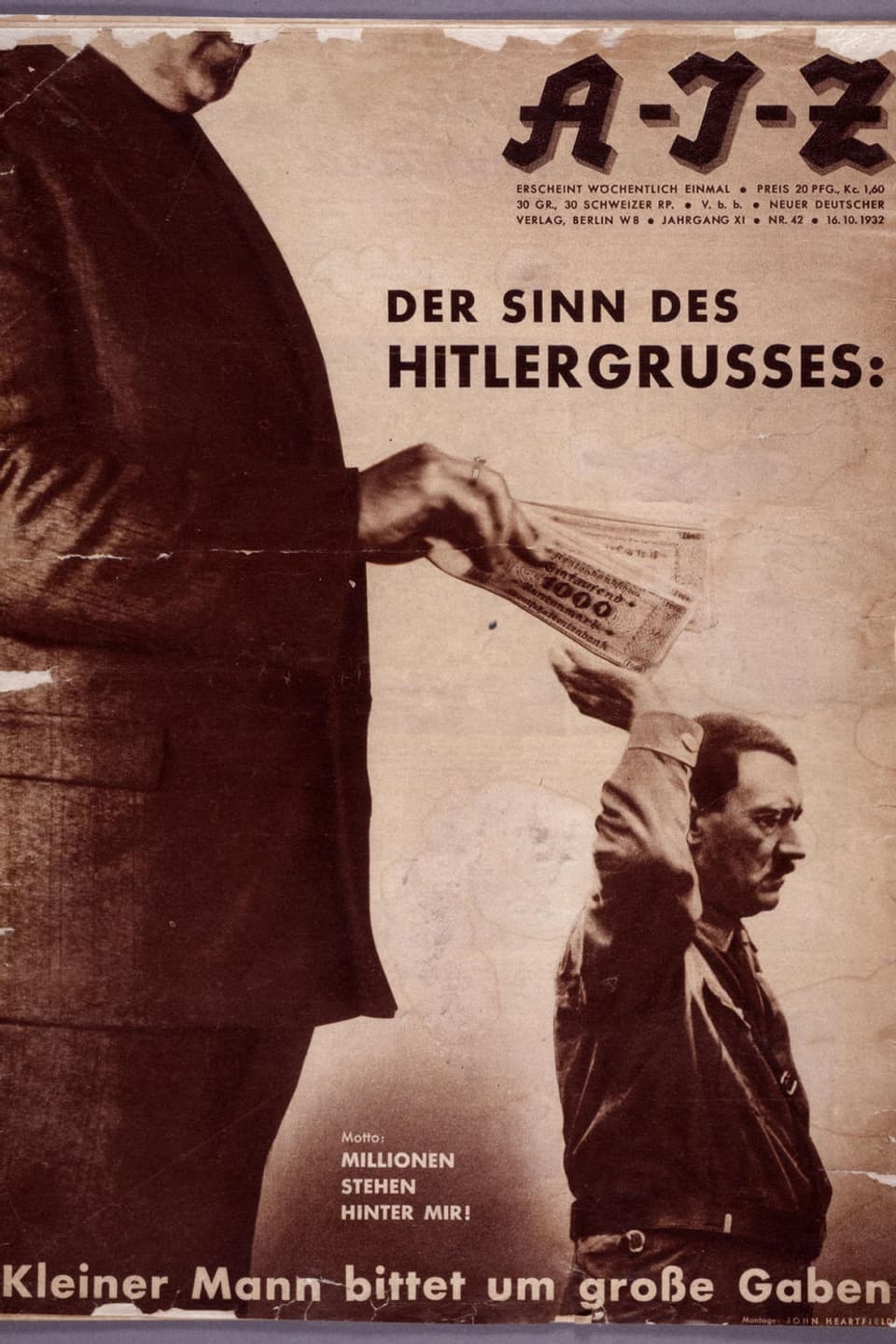 Ein grosser Mann gibt Hitler Geldscheine in seine Hand.