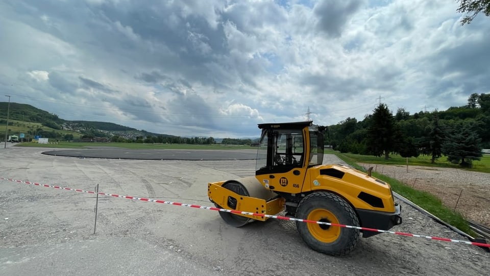 Baumaschine und Gelände