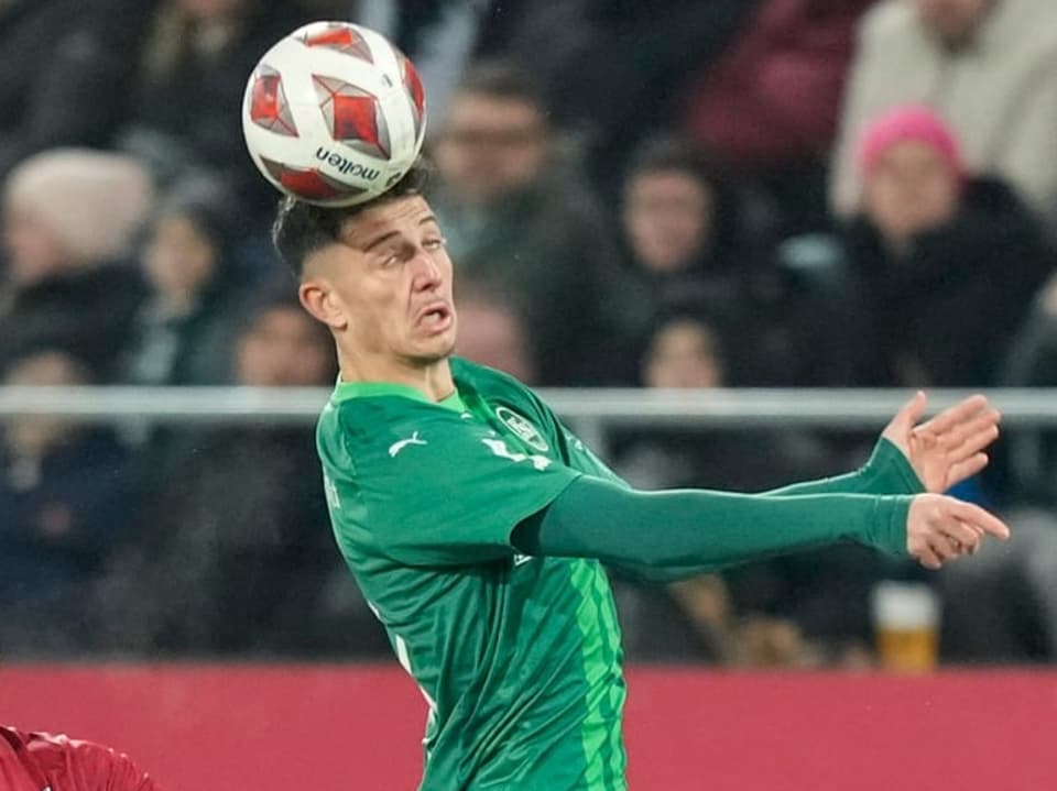 Krasniqi scores with a header