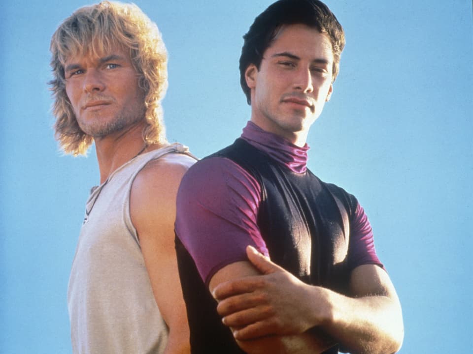 Keanu Reeves an der Seite von Patrick Swayze. In «Point Break» ermittelt er als Undercoverpolizist in der Surferszene.