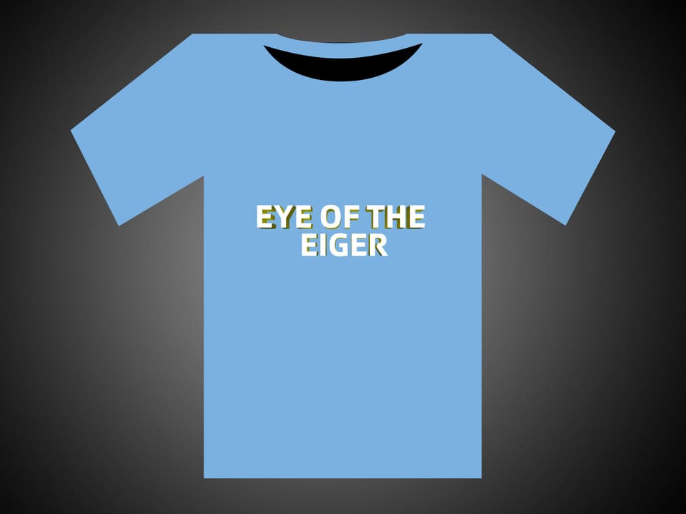 Weisse Schrift auf blauem T-Shirt: Eye Of The Eiger.