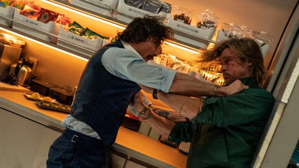 Two men fight