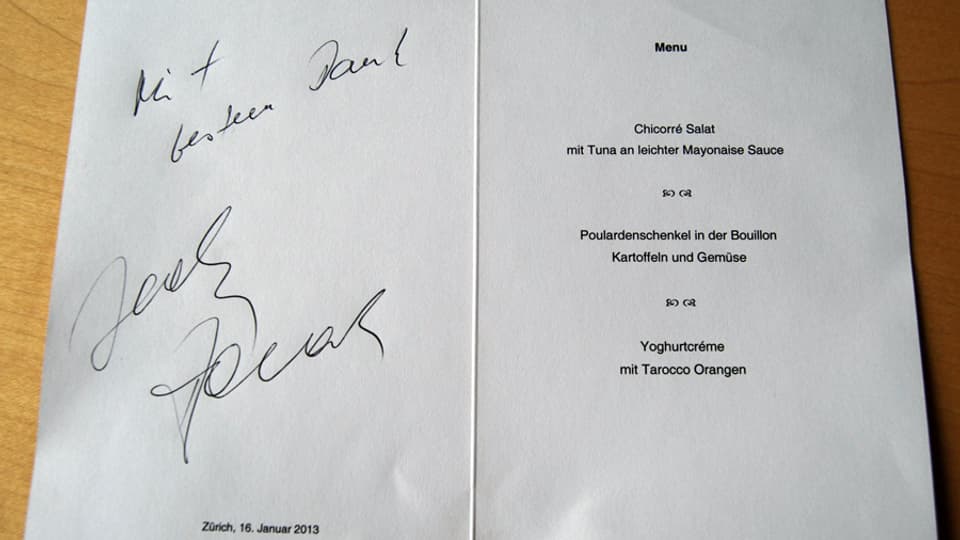 Zu sehen ist eine Menükarte, signiert von Sonnenberg-Koch Jacky Donatz. 