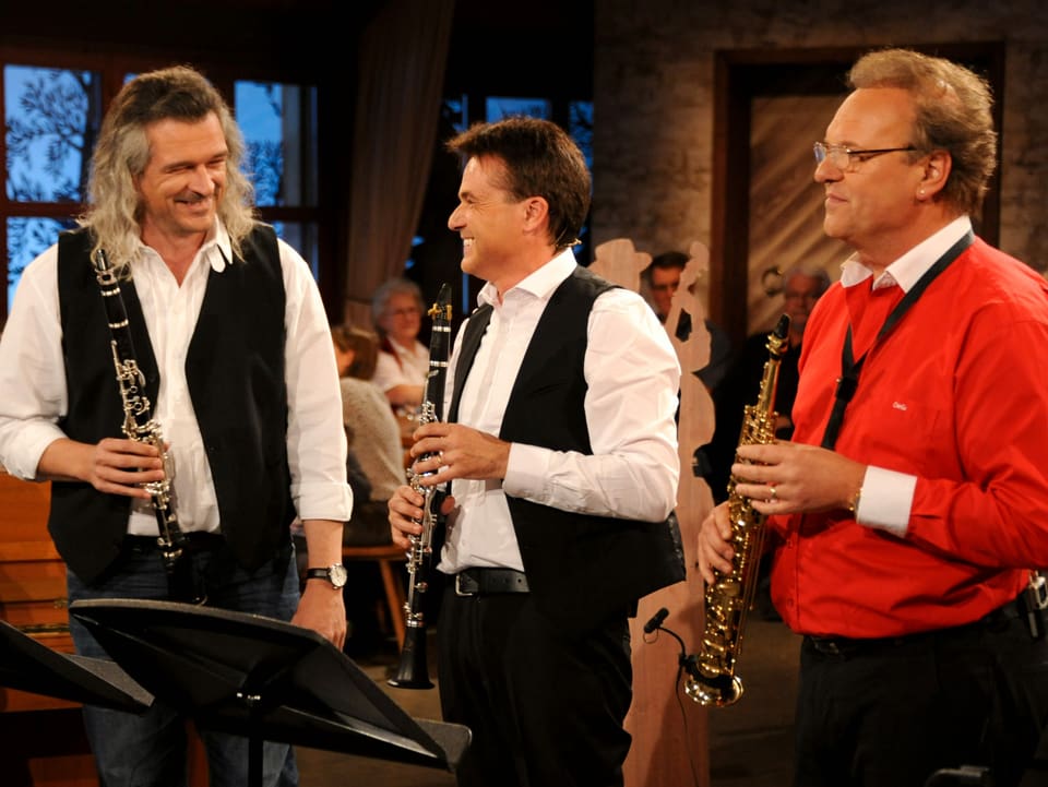 Dani Häusler, Walter Grimm und Carlo Brunner mit der Klarinette.