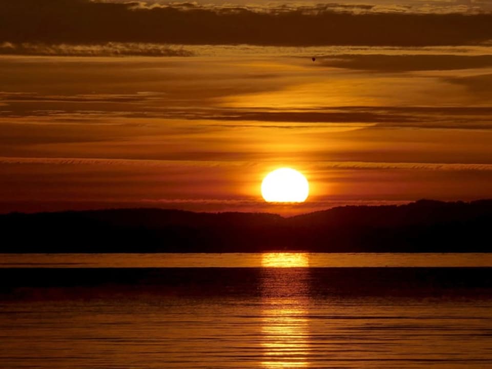 Sonnenaufgang am Murtensee