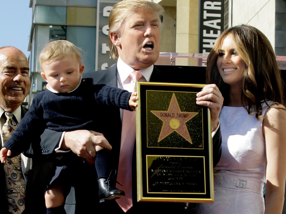 Donald Trump mit Frau und Kind im Jahr 2007.