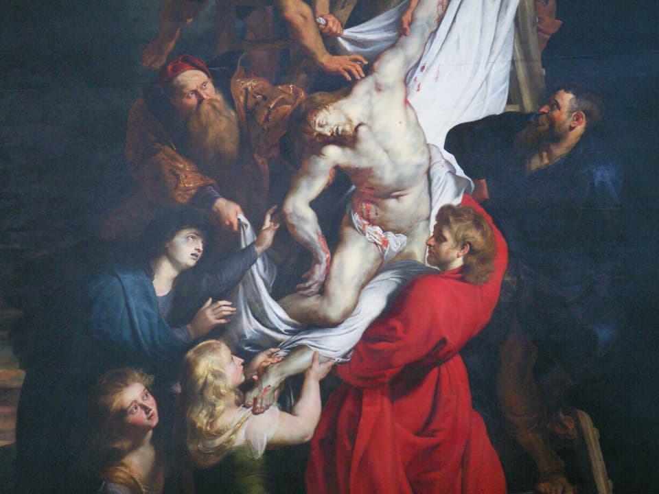 Das Gemälde zeigt Jesus, wie er von einigen Männern und Frauen in einem weissen Tuch vom Kreuz genommen wird.