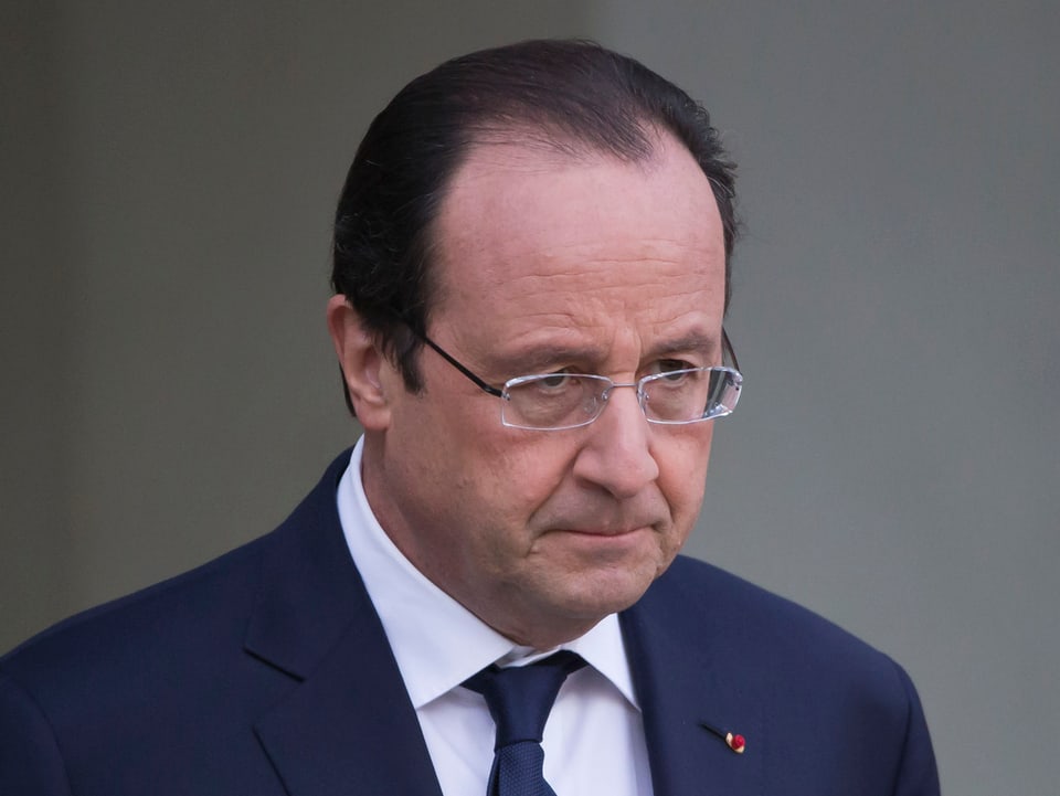 Porträt von Hollande, er schaut etwas betrübt.