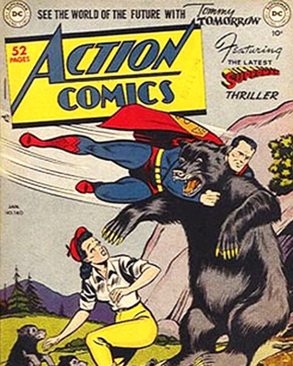 Superman fliegt auf auf einem Comic-Cover einen Bären an.