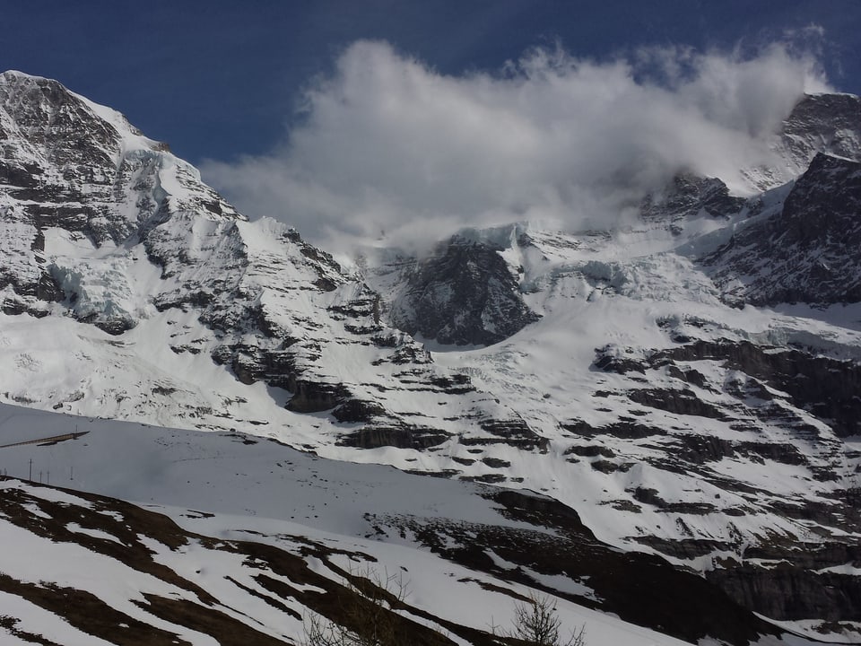 Foto von Wolken über dem Jungfraujoch.