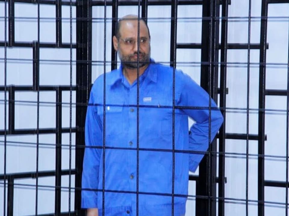 Saif al-Islam Gaddafi hinter Gittern.