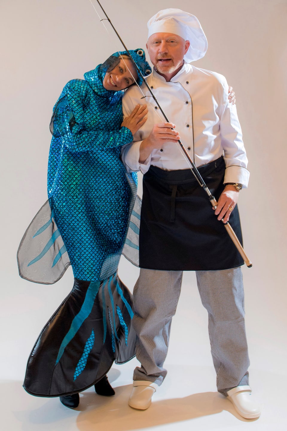 Boris Becker als Fischer und Lilly Becker als See-Hecht verkleidet.