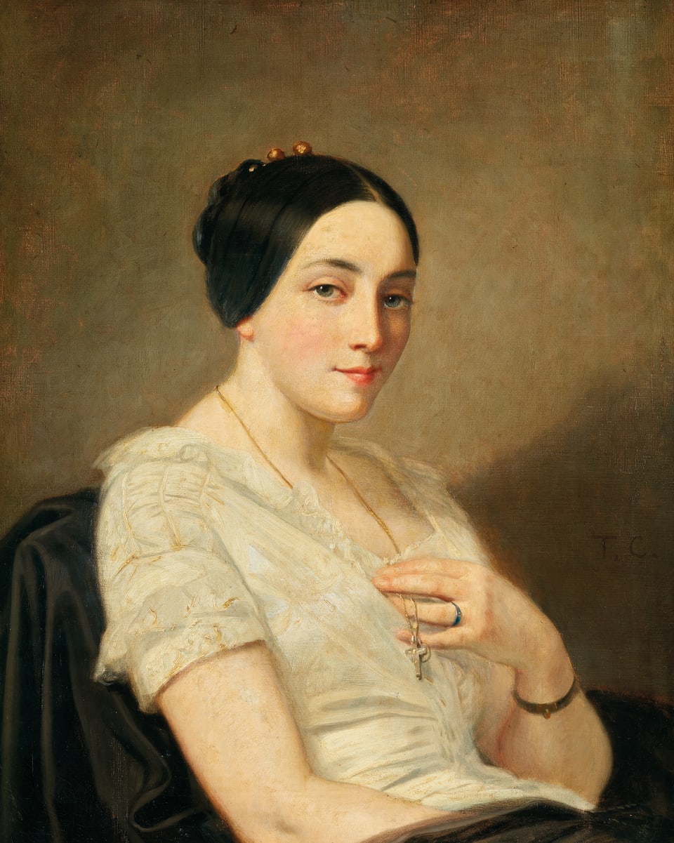 Porträt einer jungen Frau mit schwarzem Haar